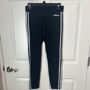 Adidas leggings with iconic stripe